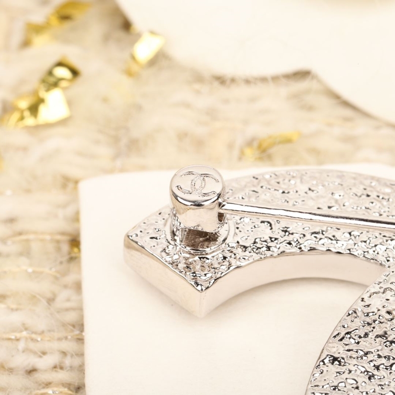 Ch**el brooches